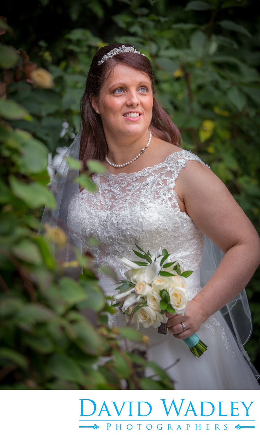 Bride in garden at Nailcote Hall