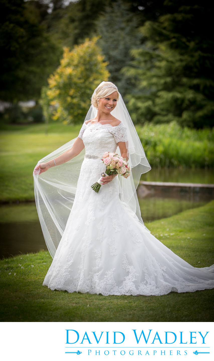Bride in the  beautiful gardens at Nailcote Hall.