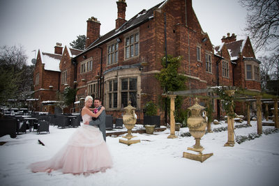 Wedding photography at Moxhull Hall Hotel in snow Sutton Coldfield.