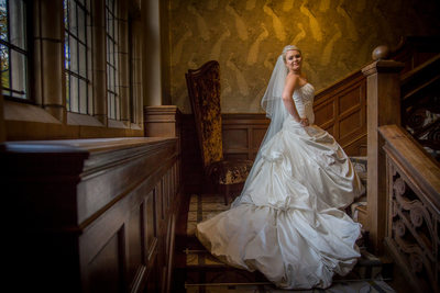 Bride photographed on the stunning staircase at Moxhull Hall Hotel on her wedding day.