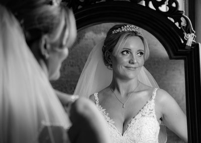 Bride with mirror at Grafton Manor.