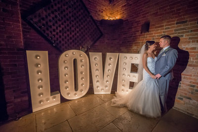 Love on the Wedding day for the happy couple at Shustoke Barns