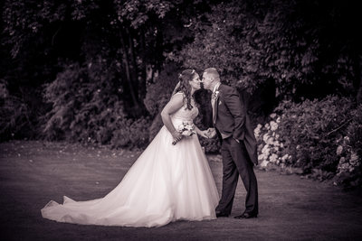 Bride & Groom holding hands at Nailcote Hall.
