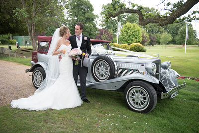 Silver wedding car at Nailcote Hall.