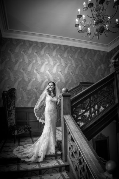 Bride photographed on the amazing stairs at Moxhull Hall Hotel.
