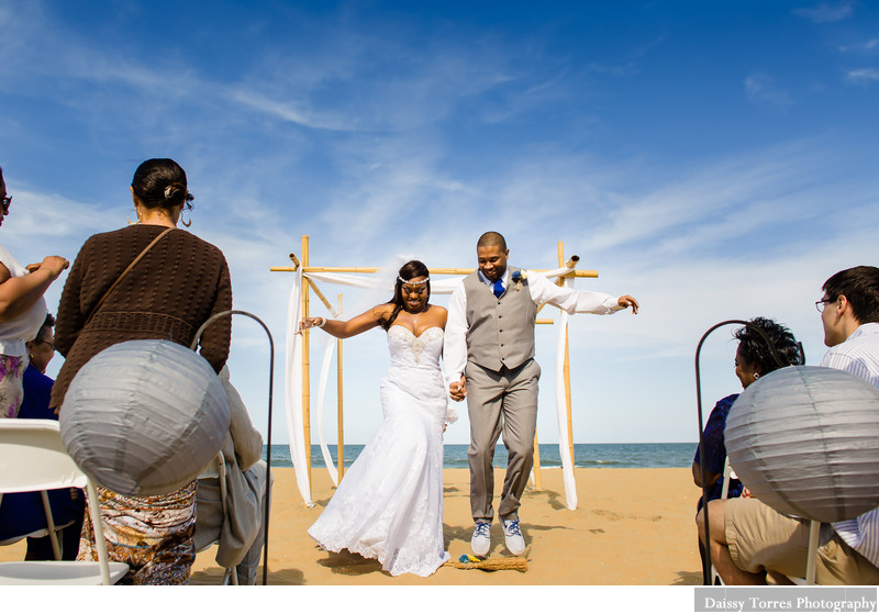 Bride and Groom jumping the Broom