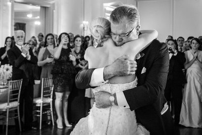 Father Holds Daughter At Brook Hollow Wedding Reception