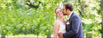 Bride & Groom kissing at Colorado State University Oval