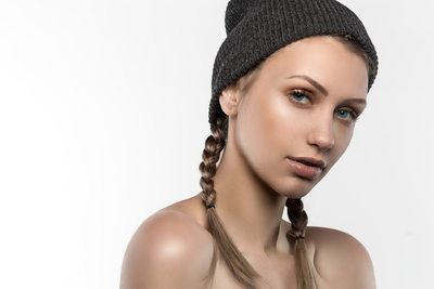 Blonde with pigtails in beanie 
