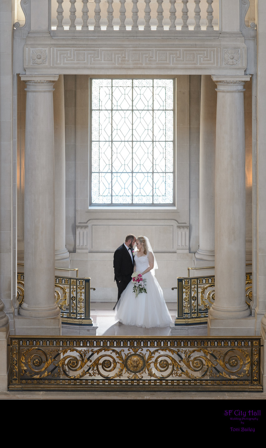 romantic wedding photograph of  couple at San Francisco City Hall