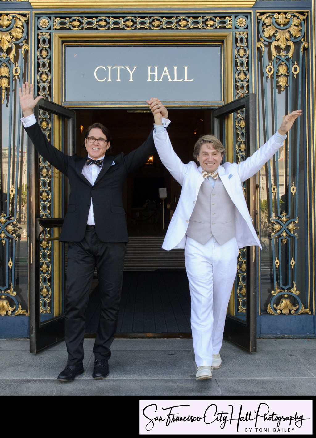 Gay Grooms walking out of San Francisco city hall - wedding photography