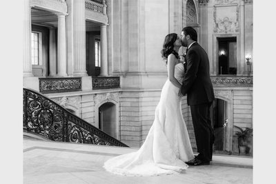 kiss at the top of city hall stairs