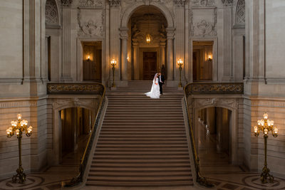 night grand staircase wedding photo