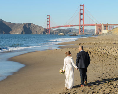 Wedding walk along the beach near sunset