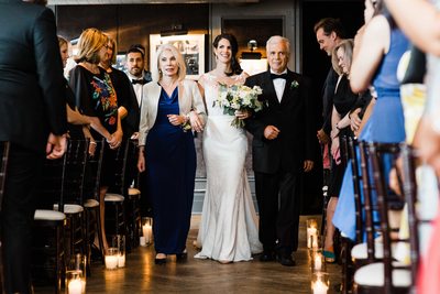 Bride Walks Down the Aisle at Storys Building Wedding