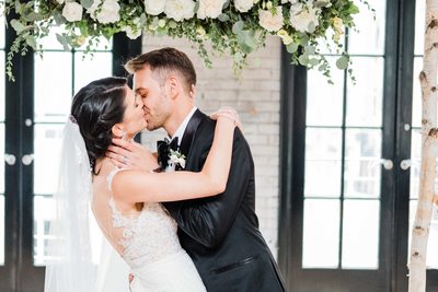 First Kiss at Storys Building Wedding