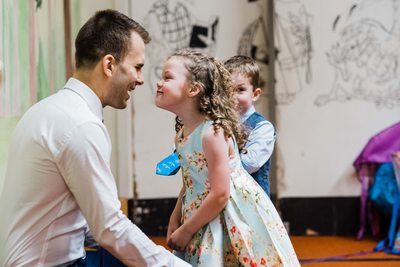 Groom Plays With His Niece