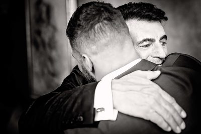 Groom Embraces His Father