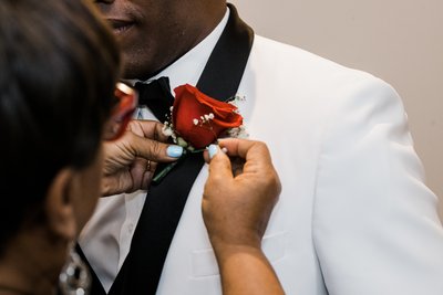 Pinning the Boutonniere