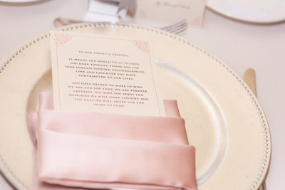 Las Vegas Wedding menu in pink napkin