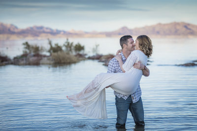 Las Vegas Couple at the lake. Husband holding wife