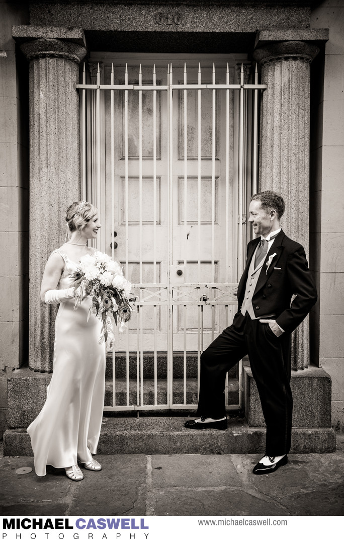 Bride and Groom Portrait in Pirate's Alley New Orleans