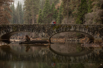 Engagement session on a bridge in Yosemite National Park 