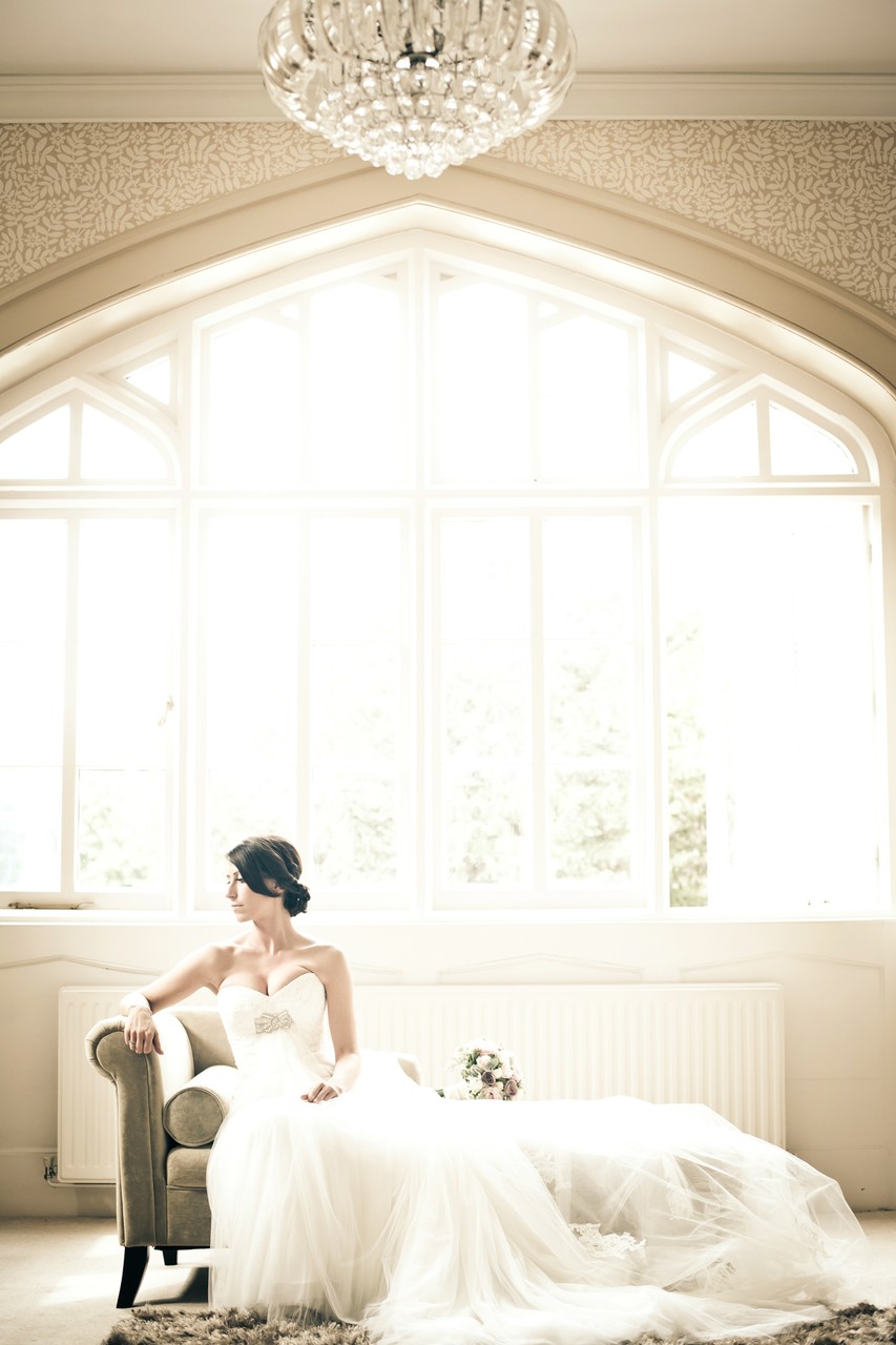 Stylish bridal portrait in natural light take at Nonsuch Manion in Epsom