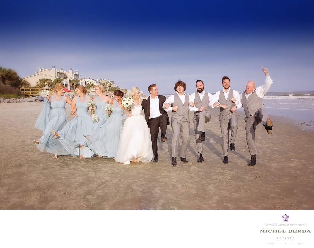 Bride and groom and bridal party at wedding ceremony at Sea Side Point Wild Dunes Resort