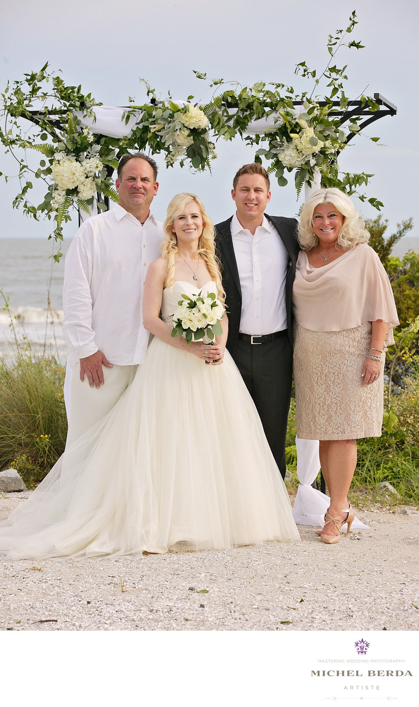 Family portrait wedding ceremony at Sea Side Point Wild Dunes Resort