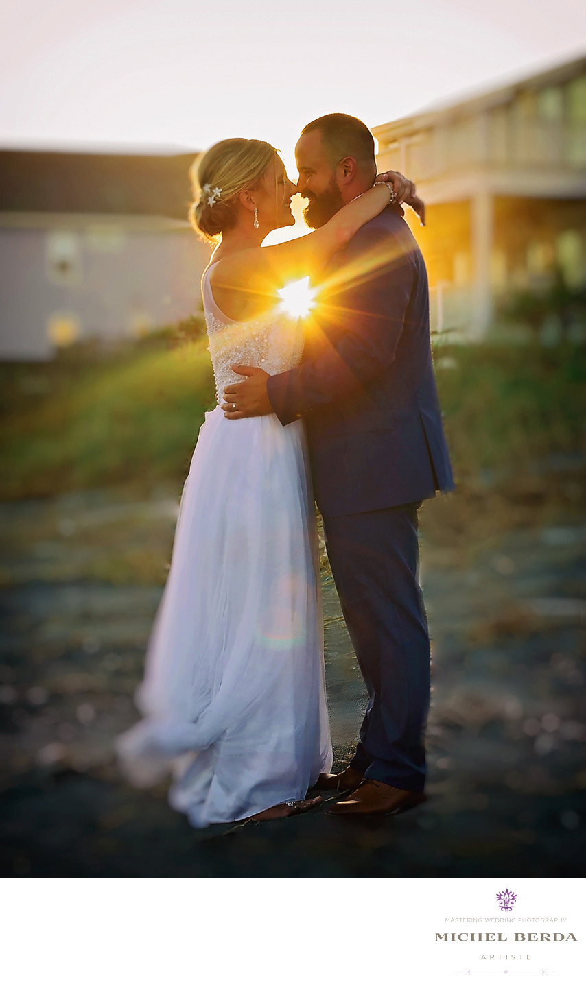 A wedding couple with the perfect sunset photo.