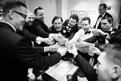 Groomsmen toast in the Board Room at the Hotel Casa Del Mar