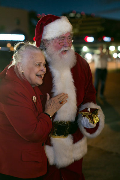 CEO of Ebby Halliday Laughs with Santa Claus