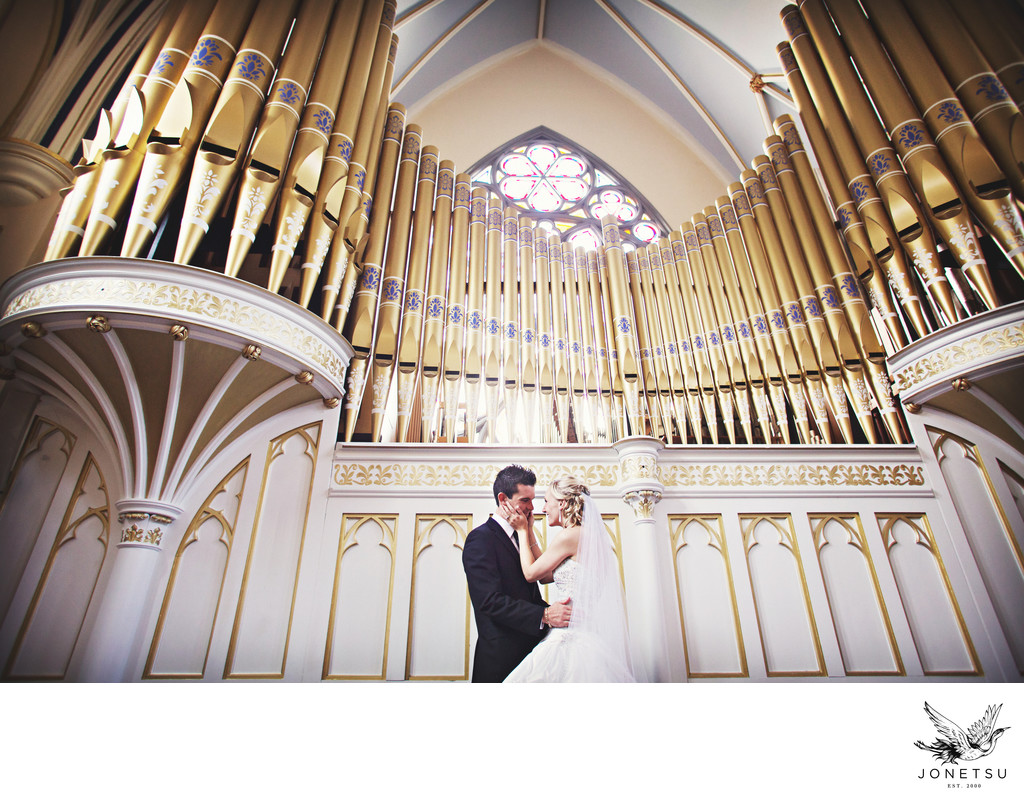 Wedding at Holy Rosary couple with organ photo