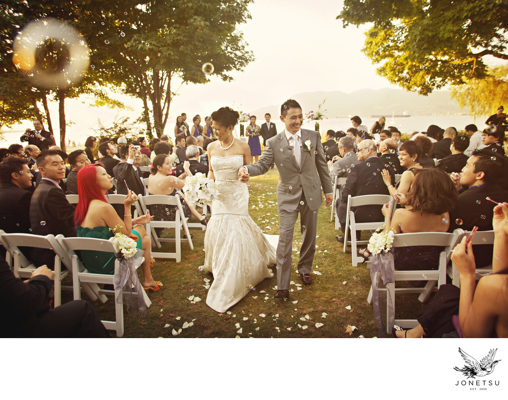 Brock House outdoor wedding aisle recessional with bubbles