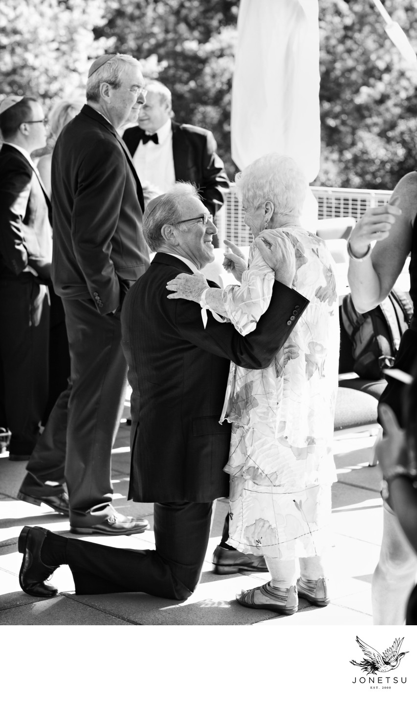 Sweet moment after jewish wedding with grandma momochrome