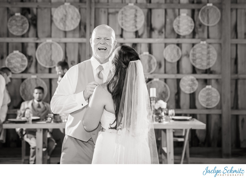 Laughing father of the bride first dance