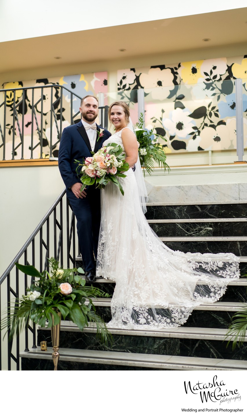 Couple on staircase at Majorette wedding venue
