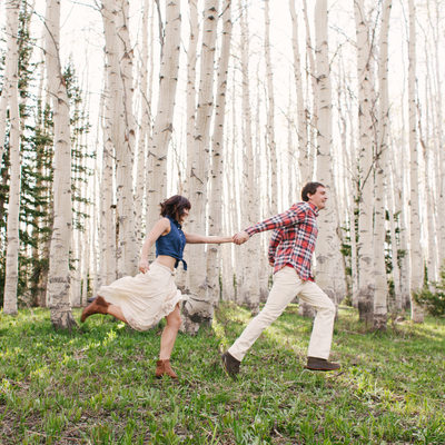 Playful Engagement Session in a Field of Aspens