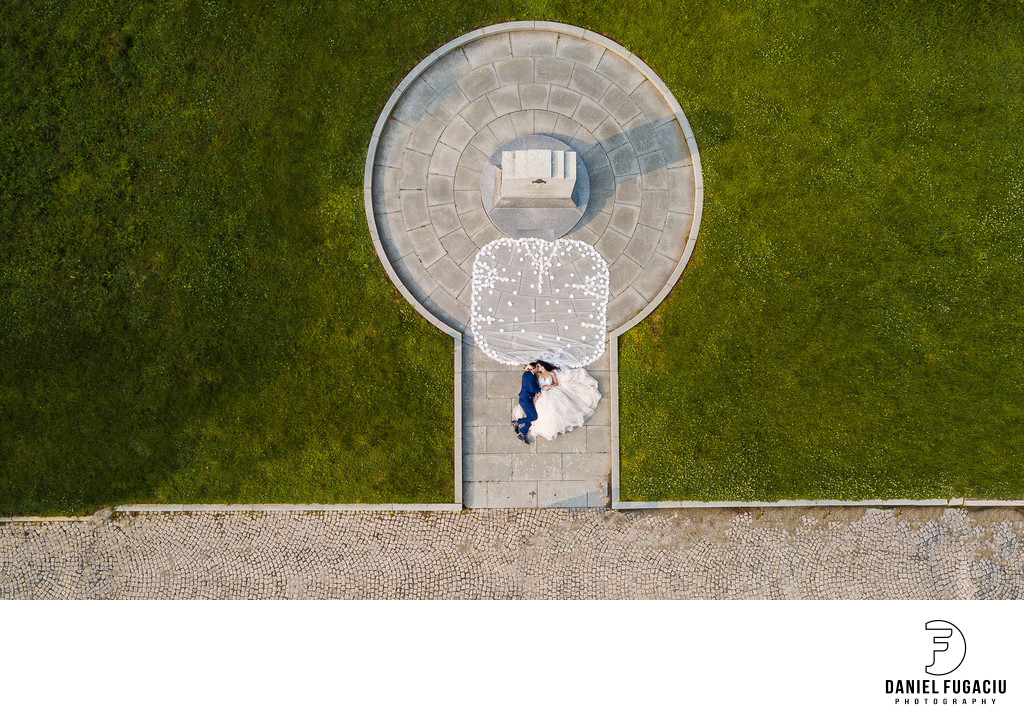 Aerial portrait of bride and groom in the park