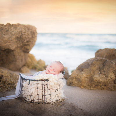 Outdoor natural light photographer newborn baby beach 