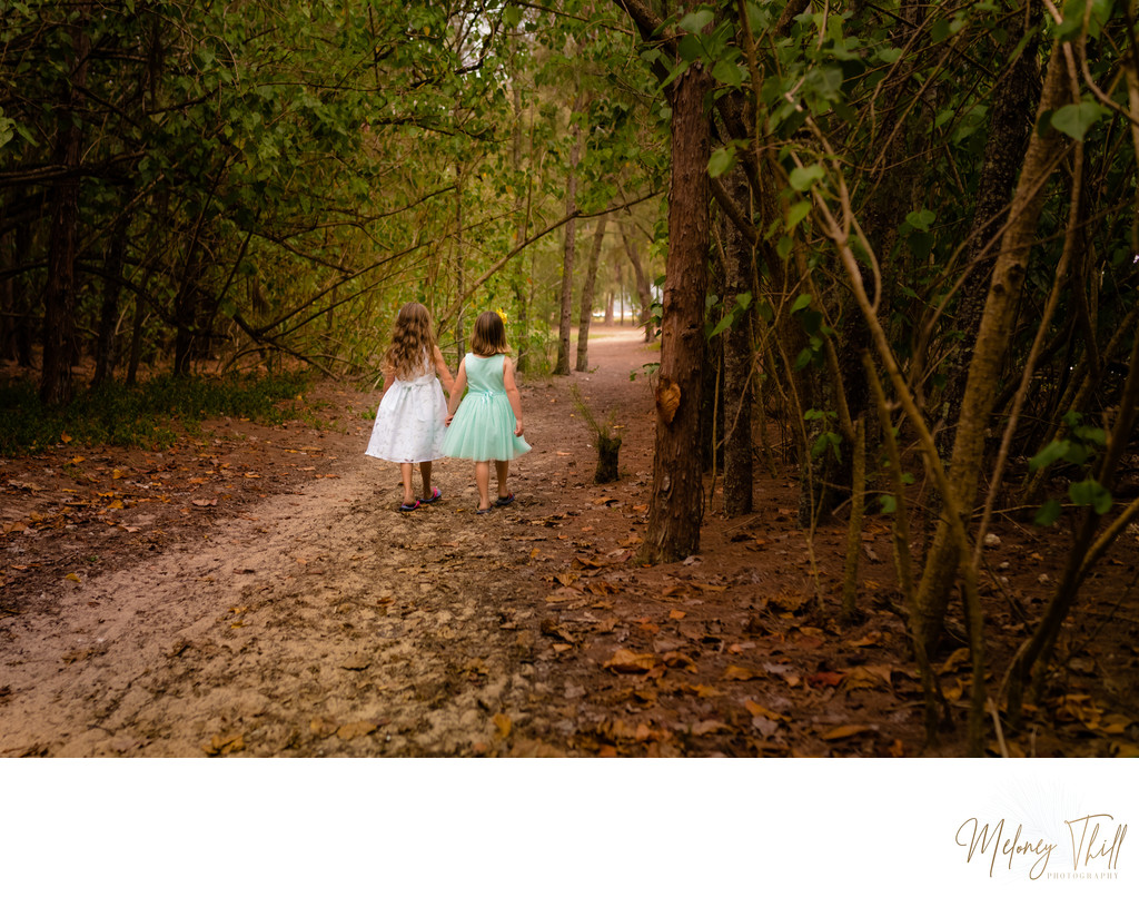 Sisters strolling through the brush at Kualoa Park - Secret Island