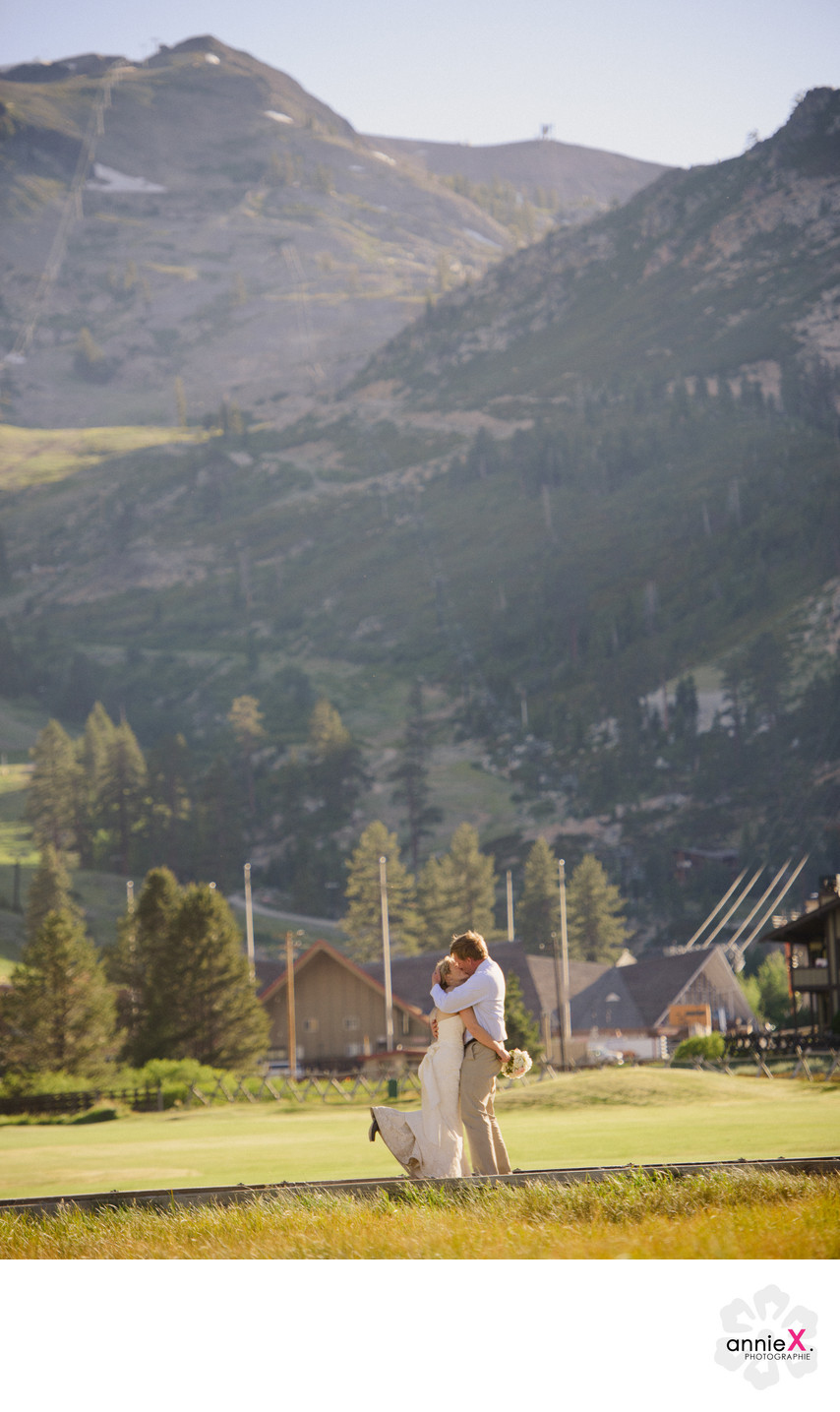 Newlyweds in meadow in Squaw Valley