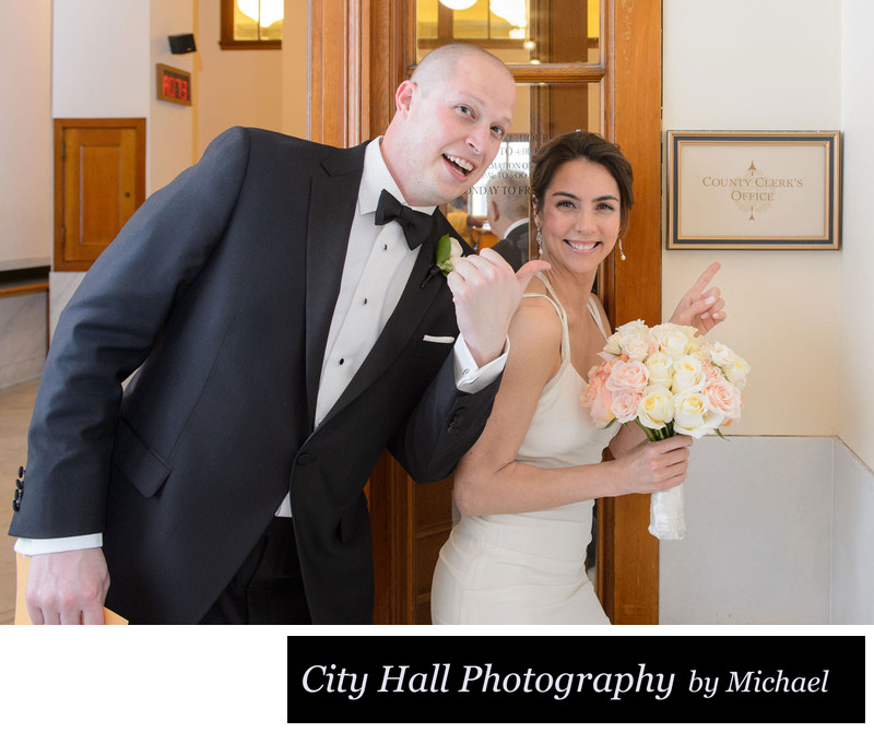  San Francisco bride and groom point County clerk sign