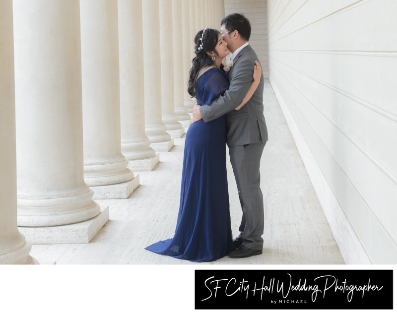 Bride changes into different wedding dress at the Legion of Honor for pictures