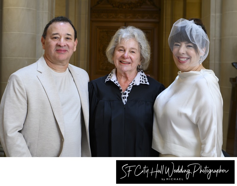 San Francisco city hall wedding officiant with bride and groom San Francisco city hall wedding officiant with bride and groom