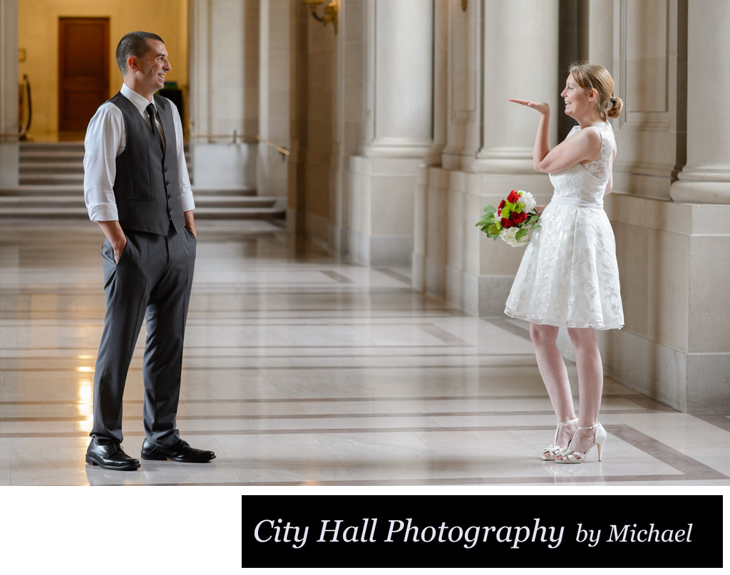 San Francisco City Hall Wedding Photographer - Bride Blowing Kiss