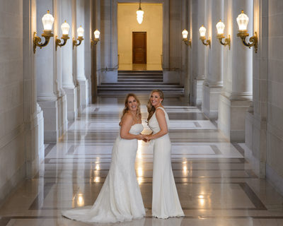 LGBT Brides in the hallway wedding photography image
