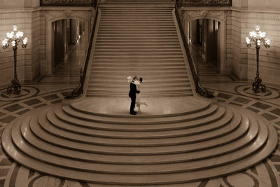 City Hall grand staircase LGBTQ wedding in San Francisco, CA