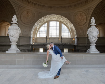 Groom Dance Dipping Bride with Kiss at SF City Hall